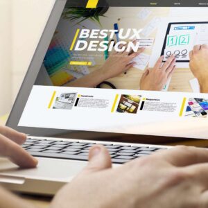 A modern responsive website design by AUZ Studio displayed on a laptop, featuring a bold "BEST UX DESIGN" headline, yellow accents, and clean layout sections for "Handmade" and "Responsive" services.