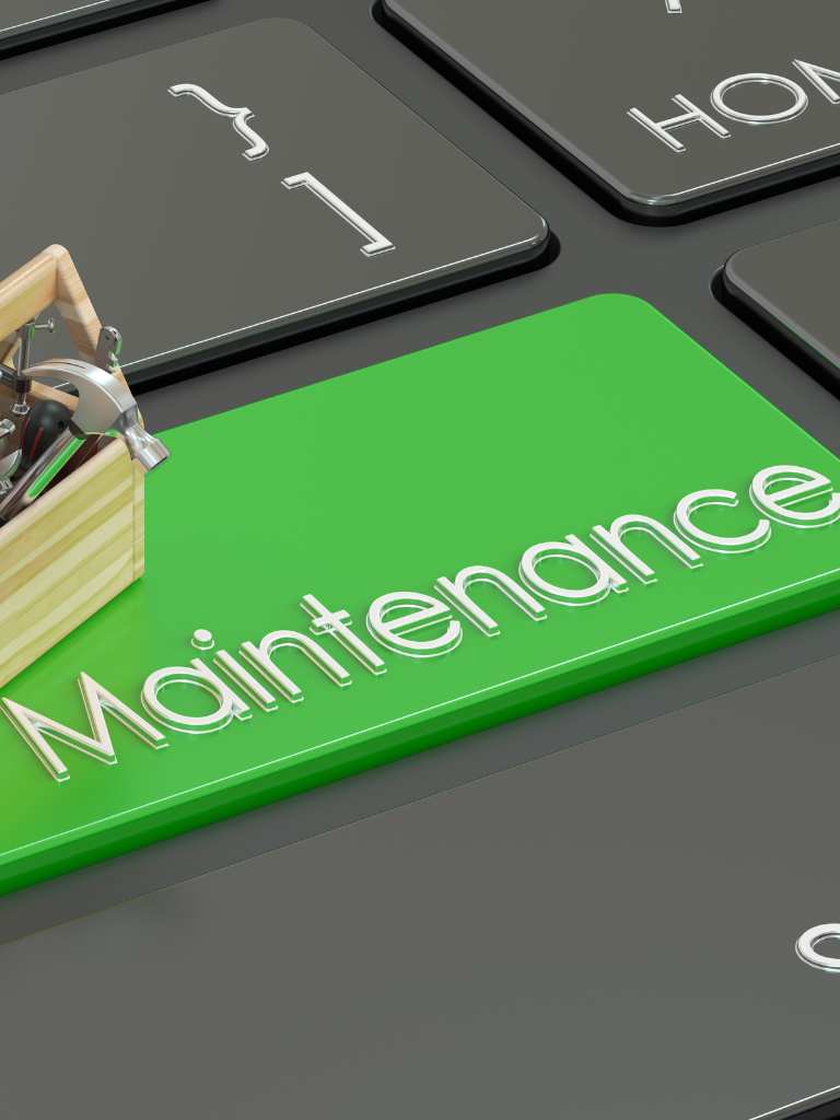 A 3D render of a computer keyboard featuring a large green "Maintenance" key next to a wooden toolbox filled with hammers and tools, representing AUZ Studio's proactive site care.